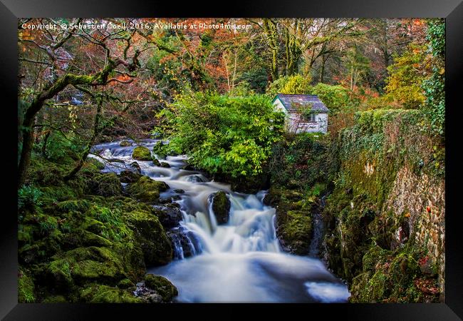 Shack by the falls Framed Print by Sebastien Coell