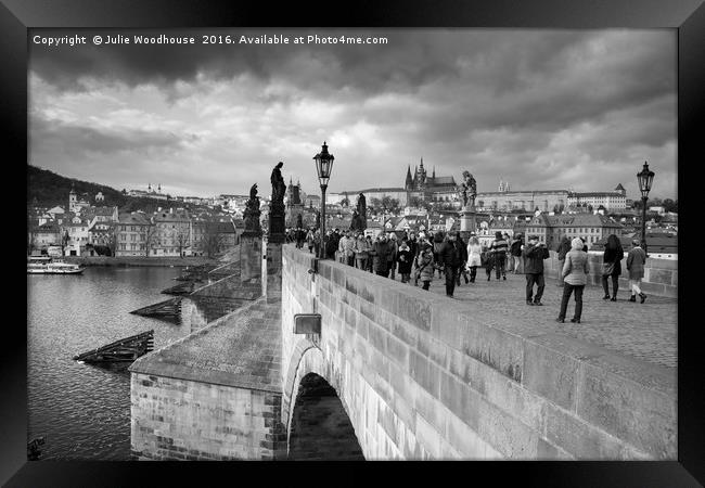 on the Charles Bridge under a stormy sky in Prague Framed Print by Julie Woodhouse