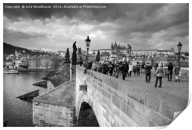on the Charles Bridge under a stormy sky in Prague Print by Julie Woodhouse