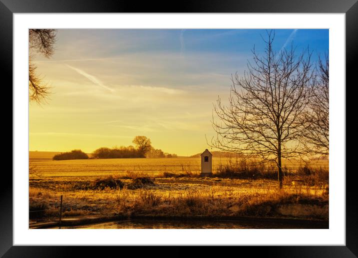 Golden winter evening in european countryside. Framed Mounted Print by Sergey Fedoskin