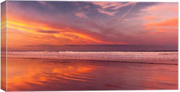 Sunset glory at Bamburgh beach Canvas Print by Naylor's Photography