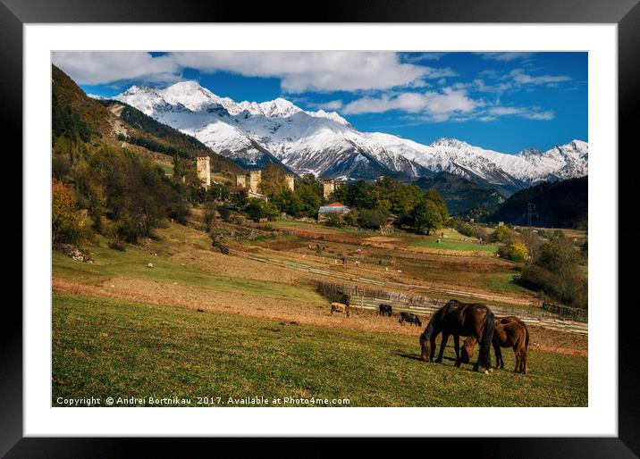 Horses against Svan towers in Mestia, Svaneti, Geo Framed Mounted Print by Andrei Bortnikau