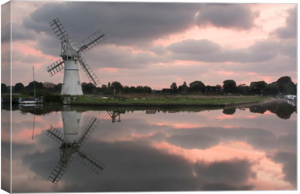 Thurne Windpump Reflection Canvas Print by Mark Hawkes