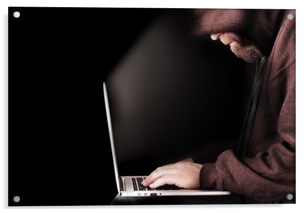 Hooded computer hacker using laptop Acrylic by Simon Bratt LRPS