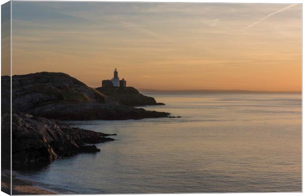 Early morning view of Mumbles lighthouse. Canvas Print by Bryn Morgan