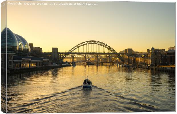 Tyne Bridge at sunset - Boat on water Canvas Print by David Graham