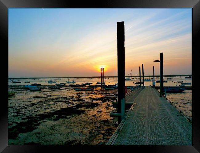 Sunsetting over the Jetty Framed Print by Linda Rampling