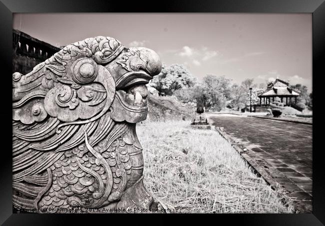 Statue in the Ancient Citadel of Hue Framed Print by Phil Wingfield