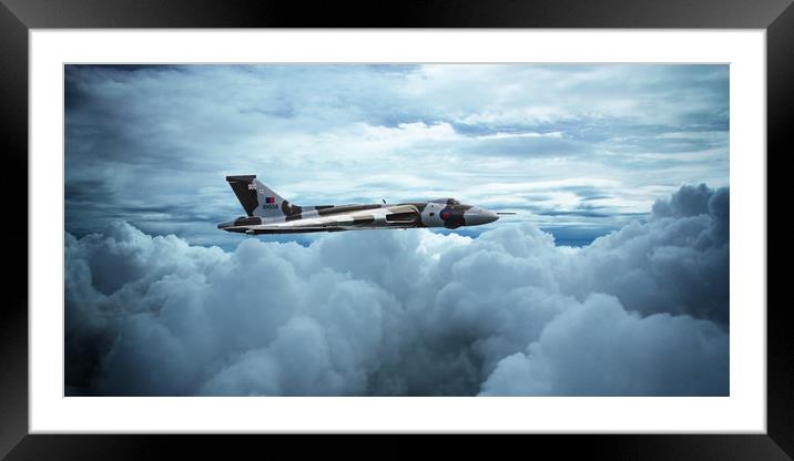 XH558 Between The Clouds Framed Mounted Print by J Biggadike