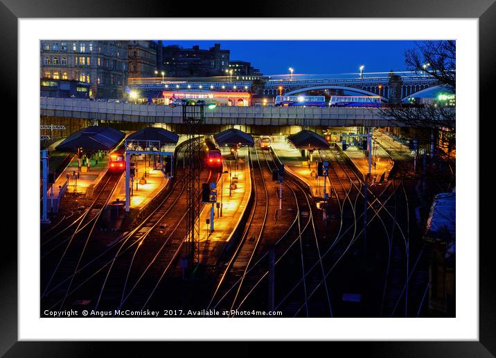 Edinburgh Waverley Station by night Framed Mounted Print by Angus McComiskey