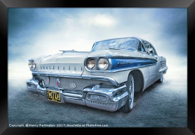 The blue and white Oldsmobile Framed Print by Kenny Partington