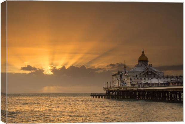Sunrise over Eastbourne Pier Canvas Print by Dave Collins