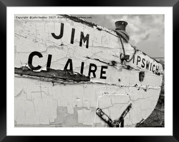 Cracked and peeling paint on an old Fishing Boat i Framed Mounted Print by john hartley