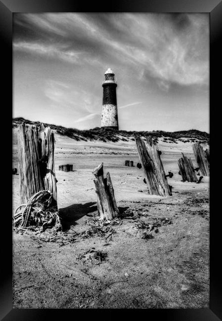 Spurn Point Lighthouse and Groynes Framed Print by Sarah Couzens