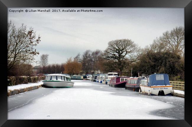 The Frozen Lancaster Canal Framed Print by Lilian Marshall