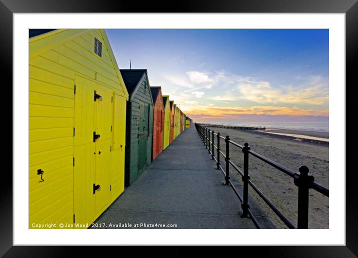 Beach Huts As The Sun Sets.. Framed Mounted Print by Jon Wood