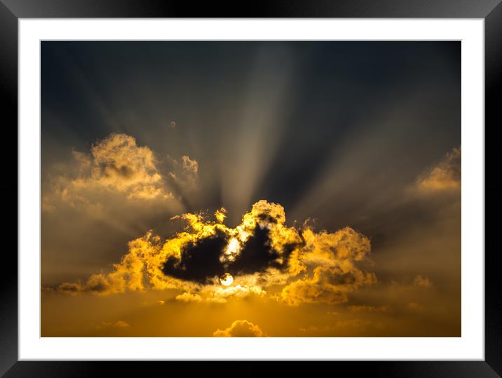 The Sun and Clouds Framed Mounted Print by Hassan Najmy