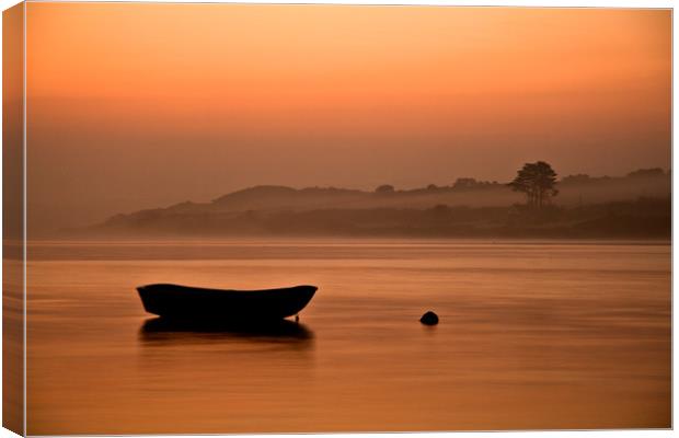 Rowing boat at rest on the river at sunrise Canvas Print by Lindsay Philp