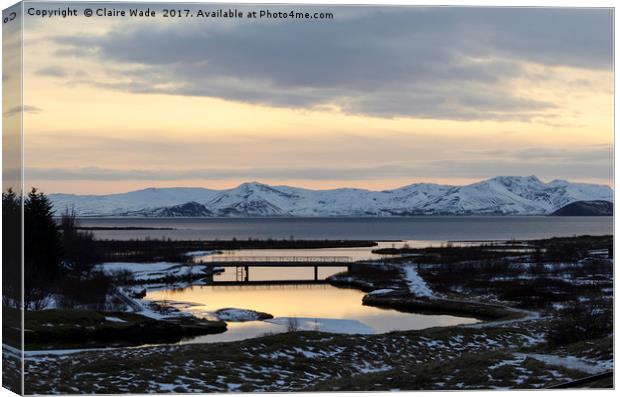 Winter sunset over Þingvellir  Canvas Print by Claire Wade