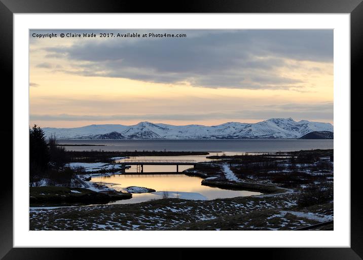 Winter sunset over Þingvellir  Framed Mounted Print by Claire Wade