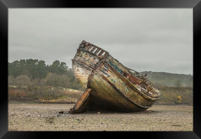 The Old Wreck in Dulas Bay  Framed Print by Chris Evans