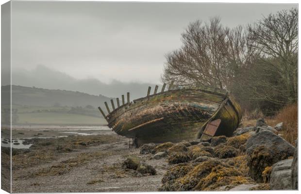 Old fishing Boat in Dulas Bay  Canvas Print by Chris Evans