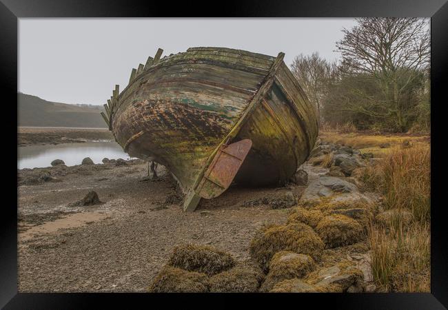 Old Wreck in Dulas Bay  Framed Print by Chris Evans