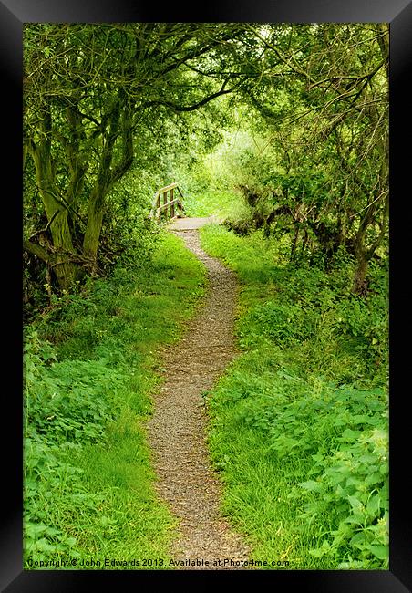 The Path to Willow Bridge Framed Print by John Edwards