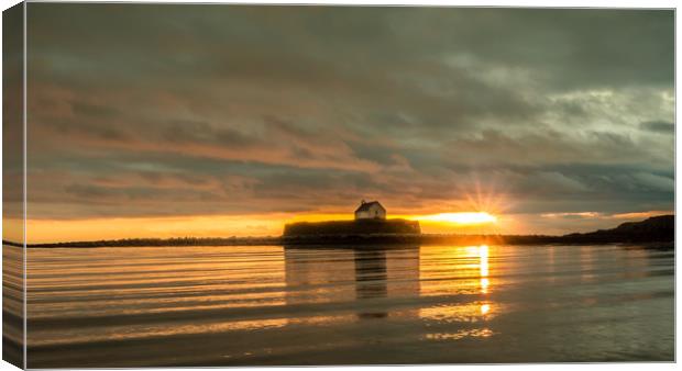 Sunset over St Cywfan's Church in the Sea. Canvas Print by Colin Allen