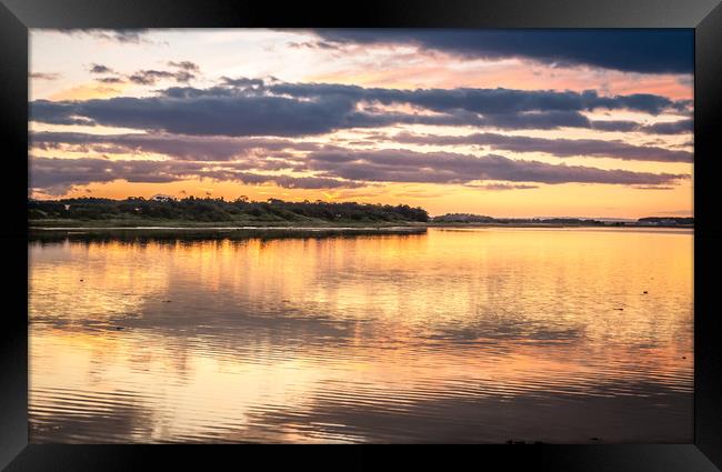 Budle Bay Sunset at high tide  Framed Print by Naylor's Photography