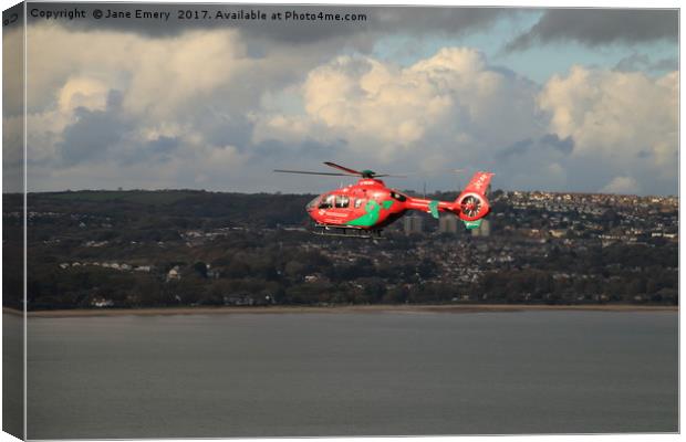 Wales Air Ambulance over Swansea Bay Canvas Print by Jane Emery