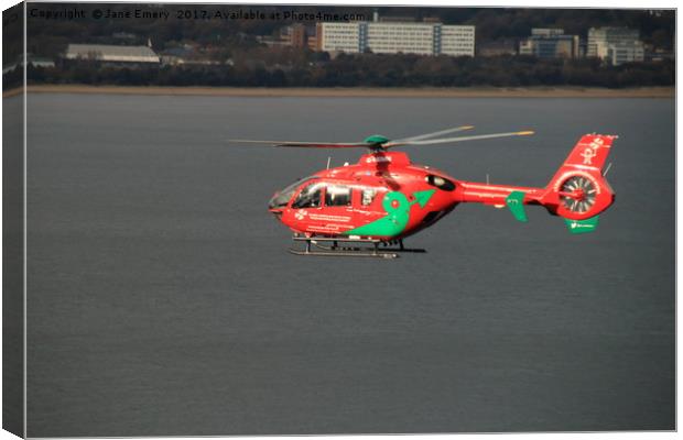 Wales Air Ambulance over Swansea Bay Canvas Print by Jane Emery