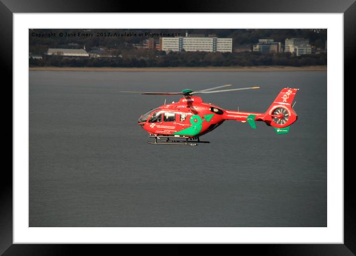 Wales Air Ambulance over Swansea Bay Framed Mounted Print by Jane Emery