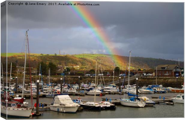 Rainbows over Burry Port Habour Canvas Print by Jane Emery