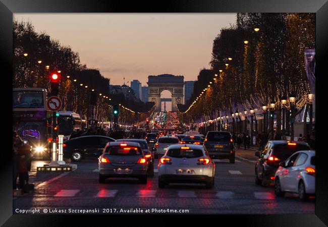 Traffic jam on Champs Elysees, Arc de Triomphe Framed Print by Łukasz Szczepański