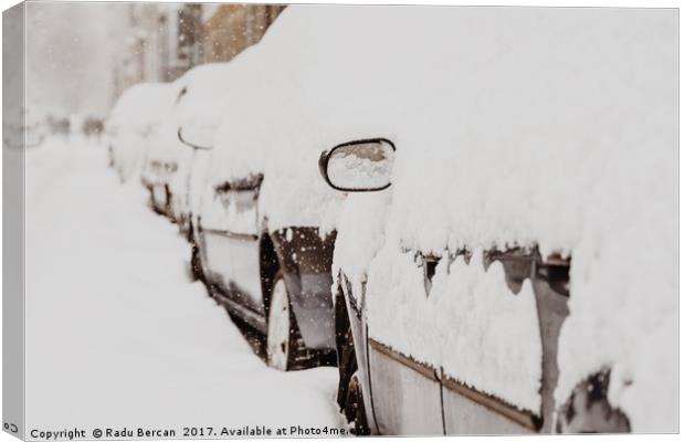 Cars Covered With Fresh White Snow After A Heavy B Canvas Print by Radu Bercan