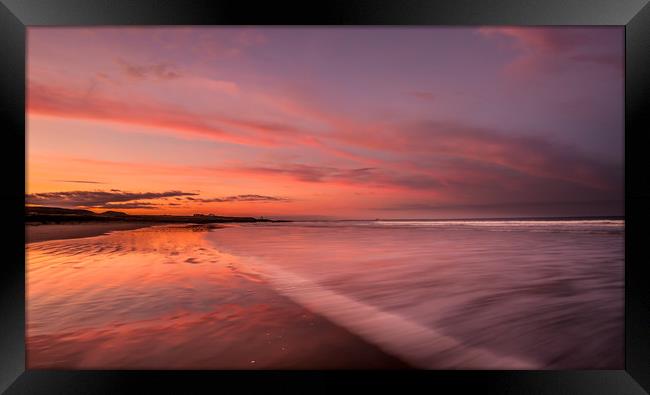 Bamburgh beach red sunset Framed Print by Naylor's Photography