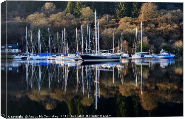 Winter yacht haven on the Crinan Canal Canvas Print by Angus McComiskey