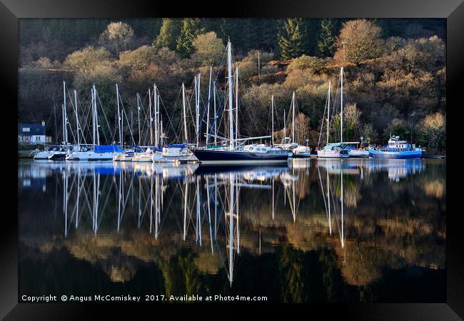 Winter yacht haven on the Crinan Canal Framed Print by Angus McComiskey
