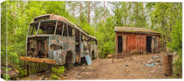 Wrecked Bus in Car Graveyard Canvas Print by Antony McAulay