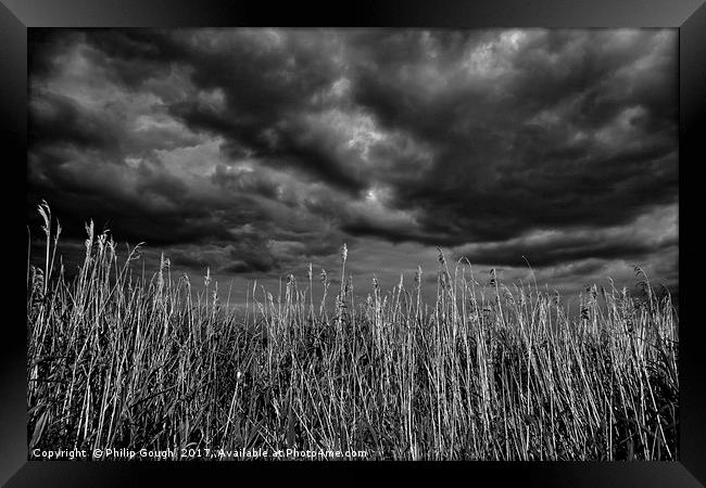 Heavy Clouds Framed Print by Philip Gough