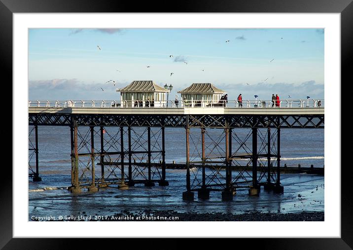Cromer Pier on the north Norfolk coast January Blu Framed Mounted Print by Sally Lloyd
