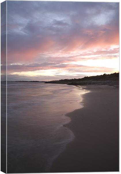 Highcliffe Beach at sunset Canvas Print by Ian Middleton