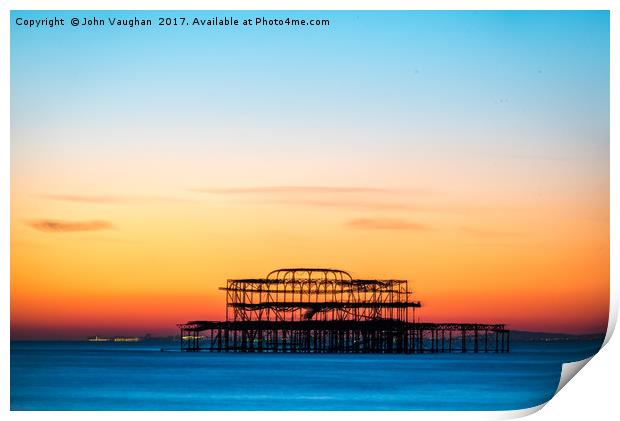 Sunset over West Pier Print by John Vaughan