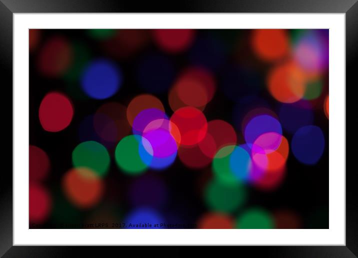 Large coloured party lights at night Framed Mounted Print by Simon Bratt LRPS