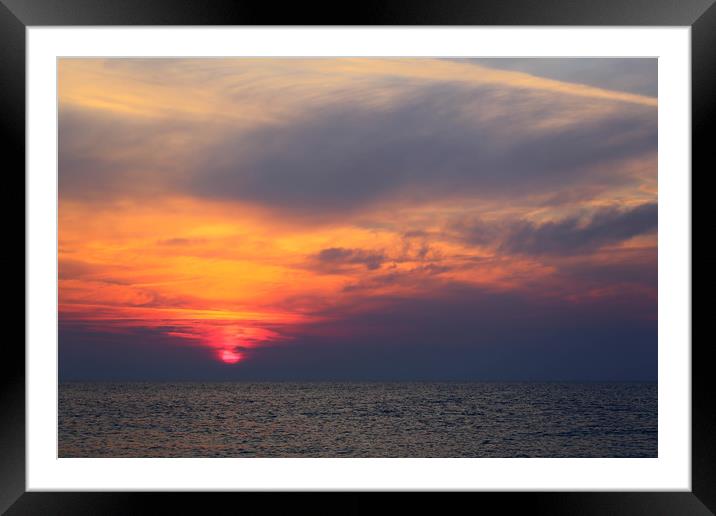sunrise over the sea Framed Mounted Print by kevin murch