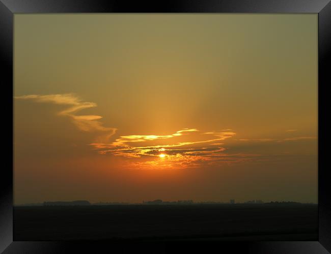 Sundown over the Lincolnshire Fens Framed Print by Mel Coward