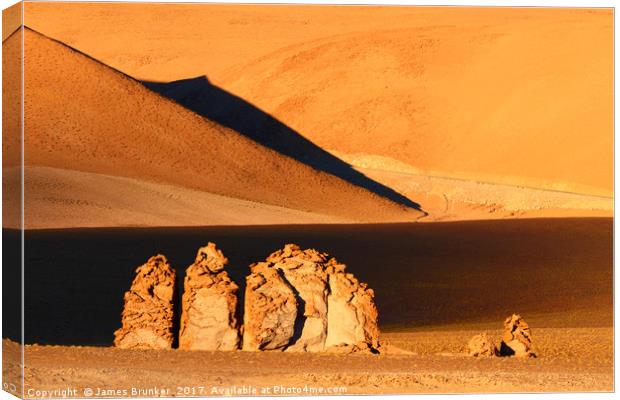 Moais de Tara at Sunrise Atacama Desert Chile Canvas Print by James Brunker