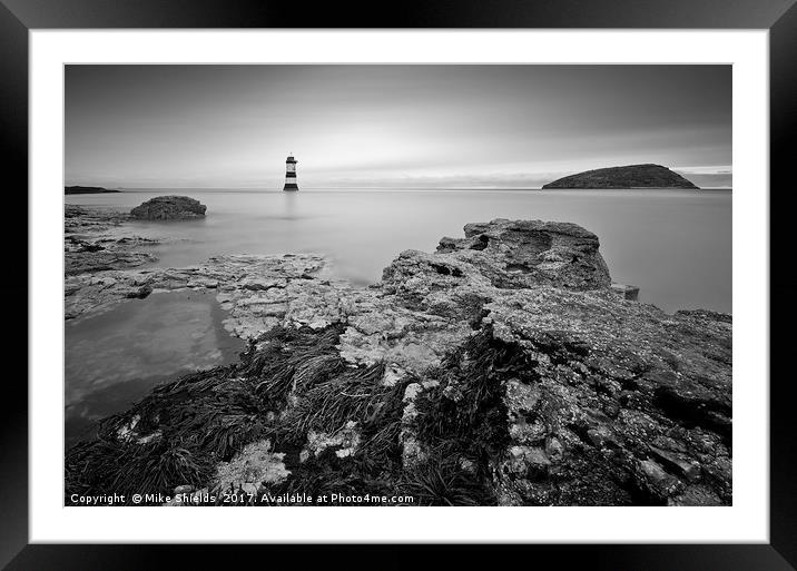 Puffin Island's Luminous Beacon Framed Mounted Print by Mike Shields