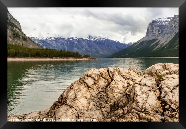 Weathered Rock on the Shore of Lake Minnewanka  Framed Print by Ann Mitchell
